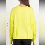 Free people Movement tempo long sleeve oversized tee in size
Medium Yellow Photo 2