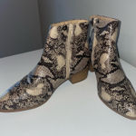 City Classified  snake skin boots Photo 0