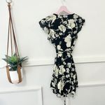 Free People  French Quarter Black & Ivory Floral Ruffle Wrap Mini Dress Size S Photo 6