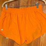 Lululemon NWT new  lit orange hottie hot shorts. 
LR women’s size 12. Photo 0