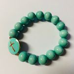 Sea Green Beaded Bracelet with Gold Cross Charm Blue Photo 0