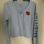 Hollister Navy And White Stripe Longsleeve With Flower Photo 0