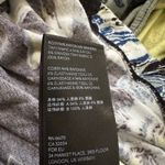 Free People  black, yellow & blue floral cold shoulder top size M Photo 7