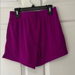 Under Armour  Women's Bold Magenta Athletic Shorts Photo 4