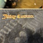 Juicy Couture new tags. I cannot open up the inside or it will cut the tag off. Photo 2