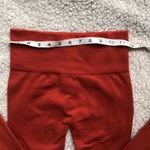 Orange high waisted yoga pants. Size XS. Orange Photo 2