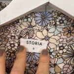 Storia  floral short sleeve romper size small Photo 4