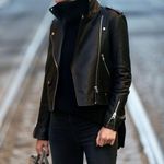 Black real leather moto jacket women’s US size small or 4 Photo 1