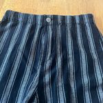 Brandy Melville black and grey striped pants. They would probably fit a size 0. Photo 1