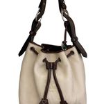 Dooney & Bourke DOONEY BOURKE Vintage Cream and Brown Leather Trim Bucket Bag Photo 0