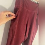 Tek Gear  red leggings size large with pockets:) ankle length Photo 1