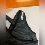 Gymshark ADAPT ANIMAL SEAMLESS SPORTS BRA
Medium Support Tiger Size Small Photo 5