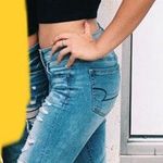 American Eagle Low Waisted Ripped Jeans  Photo 1