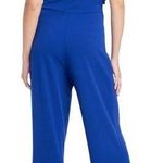 Bebe 💖 NWT Royal Blue Wide Leg Glitter Halter Jumpsuit Photo 1