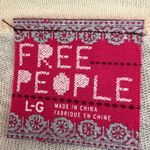 Free People  Pale yellow  Asymmetrical Buttoned Top Size L Photo 1