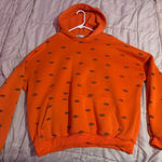 Adika  Orange Evil Eye Hoodie Photo 0