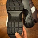 Crocs  Women's Flats in Dark Brown and Black Photo 3