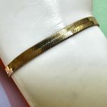 Gold tone flat herringbone bracelet Photo 2