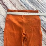 Athleta  Elation Rib Crop Flare Large Petite in Orange Photo 5