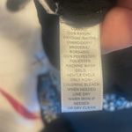 Loft XS long sleeve black romper with white embroidery Photo 6