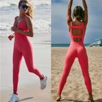 NWOT FP Movement Free People Never Better One Piece Electric Sunset S Pink Photo 1