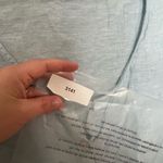 Sigrid Olsen  Woman Size  Medium 100% linen roll-tab tunic blouse in a light blue Photo 6