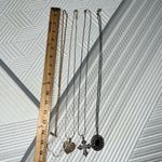 Set of 4 necklaces to gold two silver needs some cleaning worn each maybe once Photo 6