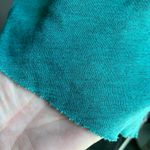 H.I.P. uneven hem flowy green top with round neck Photo 10