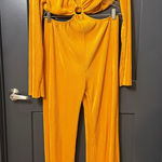 Chic Yellow Jumpsuit with Ring Detail Size L Photo 0
