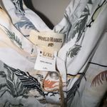 Cost Plus World Market Orange and White Floral Romper Size undefined Photo 4