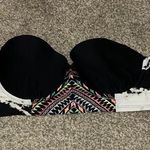 Cute swim top size small good condition. Perfect to pair with black bottoms Photo 1