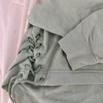 Nike  Lace-Up Sweatshirt Cropped Photo 1