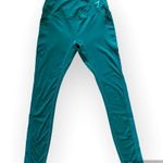 Gymshark Sage Green Leggings with Pockets and Mesh Side Panels in Size S Photo 0