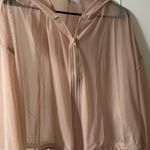 Revolve Sheer zip up Photo 2