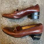Gucci Heels Are Vintage leather brown in color.. needs a good polish. In great condition no Flaws. Photo 7