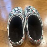 Crocs women’s multi colors lined clog sandals size 10 . Photo 2