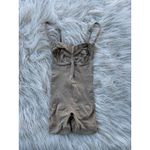 SKIMS Seamless Sculpt Strapless Shortie Bodysuit Clay
Size Small Photo 2