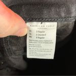 American Eagle Curvy hi-rise Jeggings crop black‎ button fly distressed size 0 Photo 8
