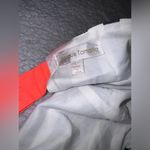 Jealous Tomato Dark Navy and White Striped Boutique Dress w/ Open Back & Orange Accent Straps. Photo 2