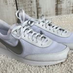 Nike  Womens Daybreak Sneaker Size 8 White and Metallic Silver Photo 0