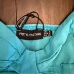 Pretty Little Thing Turquoise Strapless Top Photo 1