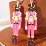 Boutique Handmade pink and black wooden nutcracker earrings with gold accents #holiday Photo 1