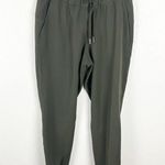 Lululemon  On The Fly Olive Green Wrinkle Free Quick Drying Joggers, Size 8 Photo 0