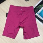 Bally Total Fitness  fuchsia red bike shorts, size medium, new Photo 1