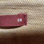 Pilcro Anthropologie  low-rise slim cargo straight leg warm tan color size 28 Photo 2