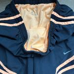 Nike  running shorts black and orange Photo 2