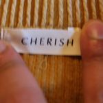 Cherish Top Photo 1