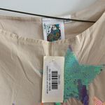 Queen of Sparkles. NWT size XS tan star dress. Photo 2