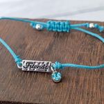 Bright Light Blue Adjustable Bracelet with Friends Charm Photo 0