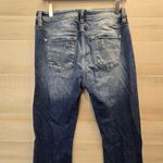 {29} KanCan Distressed Blue Jean Split Flare Hem Fringe Detail Photo 9